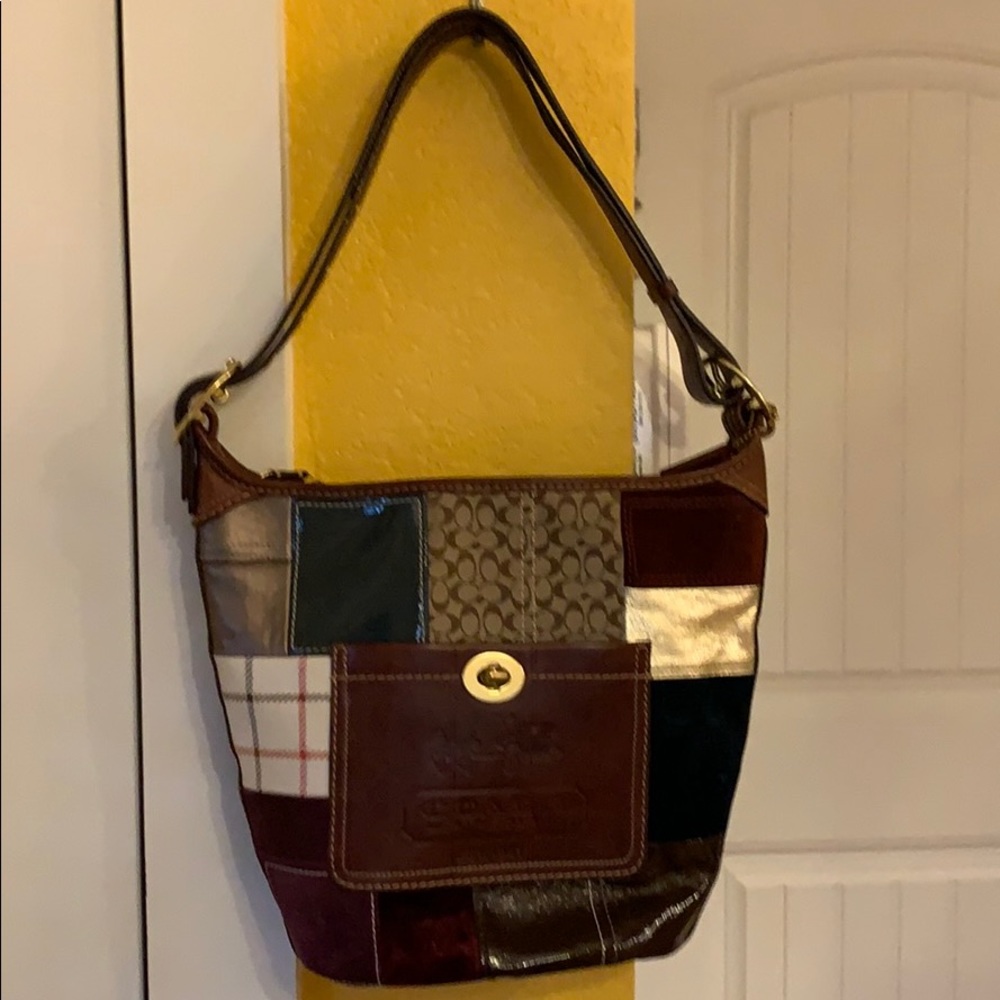 Coach over the shoulder bucket style tote bag